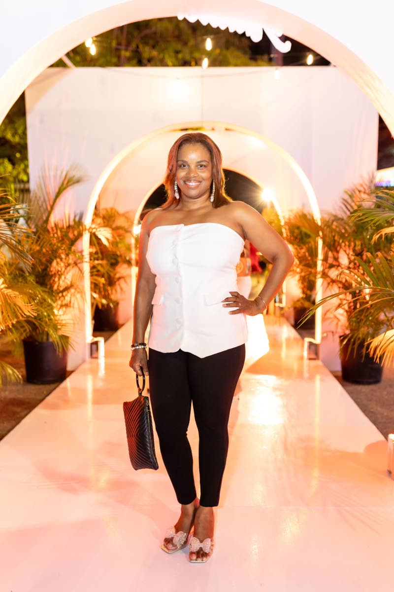 Consultant cardiologist Dr Lisa Hurlock pulls on classic black and white.