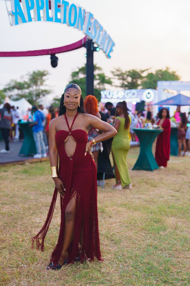 Gianna Granston swipes right on a burgundy crochet dress that perfectly complements her silhouette.