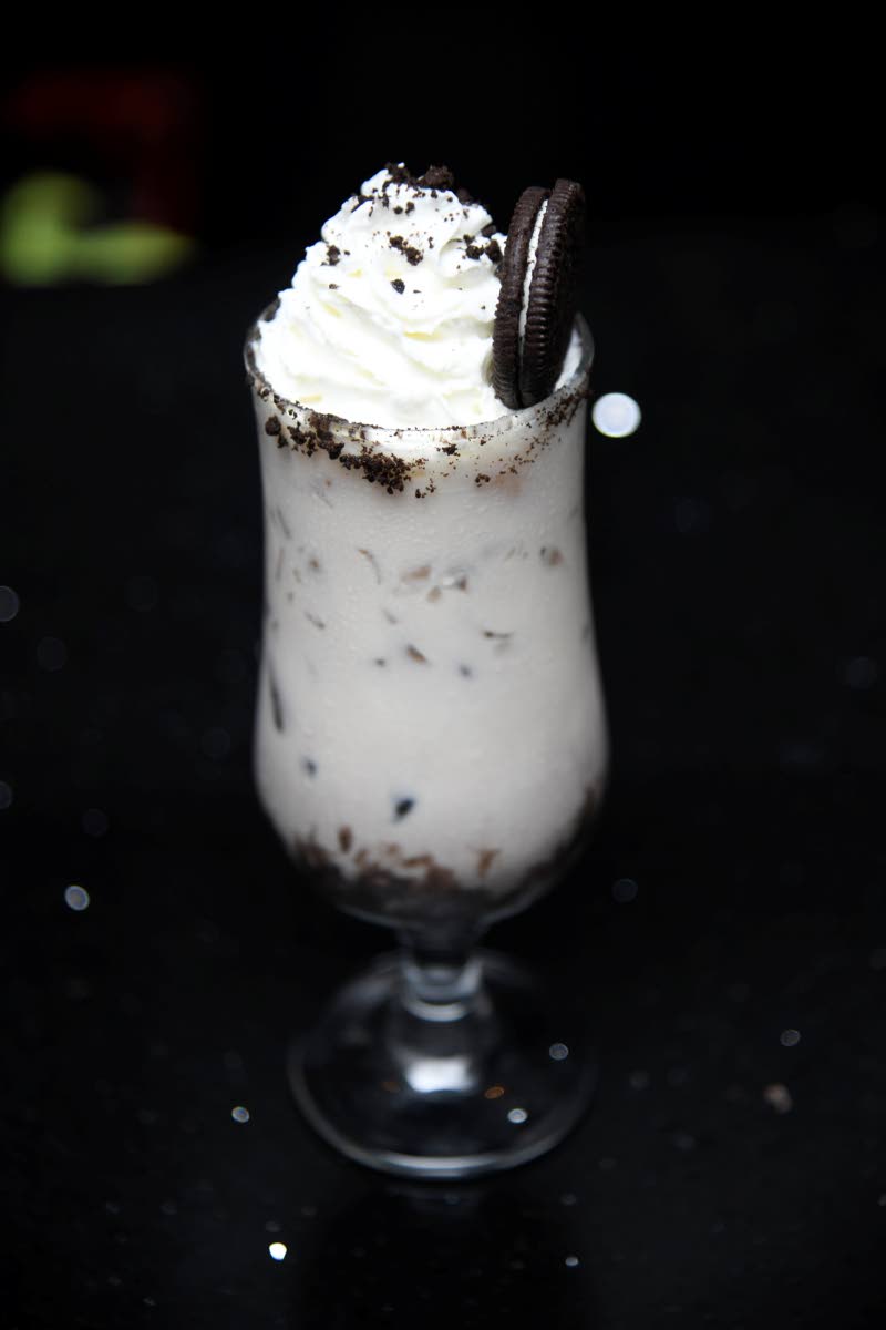 Twilight is a milky-based cocktail infused and topped with Oreos. 