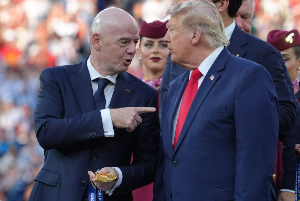 FIFA President Gianni Infantino, left, and President Donald J. Trump talk as they wait to congratulate the Spanish players after the World Cup final football match between Spain and Argentina in East Rutherford, N.J., near New York, Sunday, July 19, 2026. 