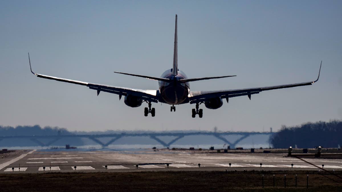 A plane lands at Ronald Reagan Washington National Airport in Arlington, Virginia.