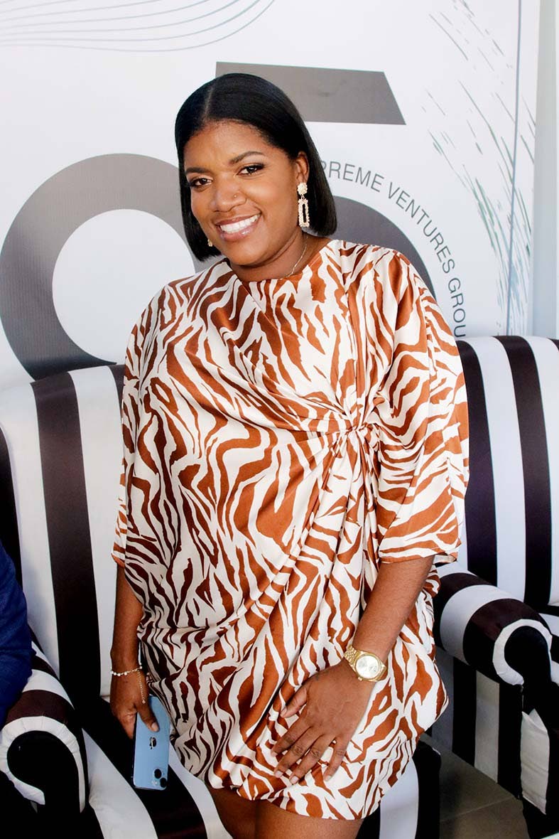 Tasked with ensuring VIP guests enjoyed an unrivalled experience, Terryana Taylor, hospitality coordinator at Caymanas Park, dons a brown and white zebra print mini dress.