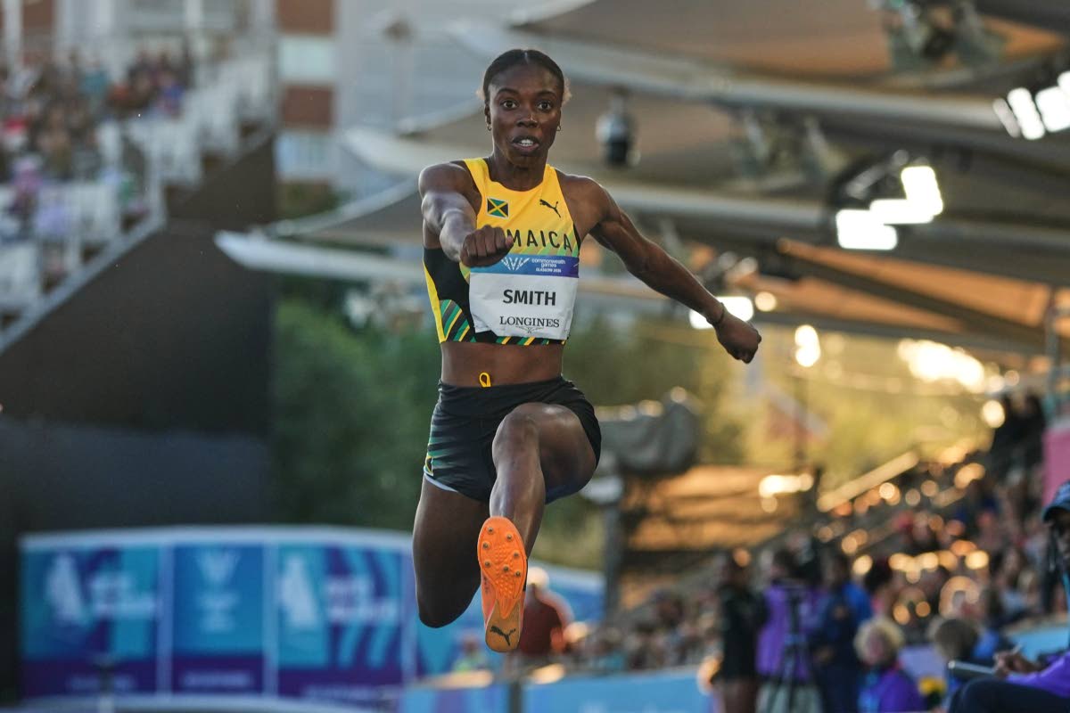 Jamaica's Ackelia Smith competes in the women's triple jump final at the Commonwealth Games in Glasgow, Scotland yesterday. Smith won the silver medal with a best of 14.04 metres.