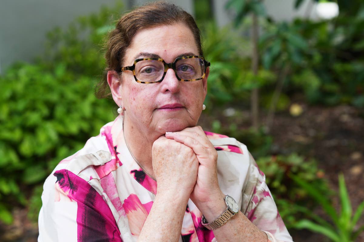 Miriam Singer, CEO of Jewish Community Services of South Florida, pauses as she speaks of the home health workers she had to let go after their TPS expired last week in Miami Beach, Florida.