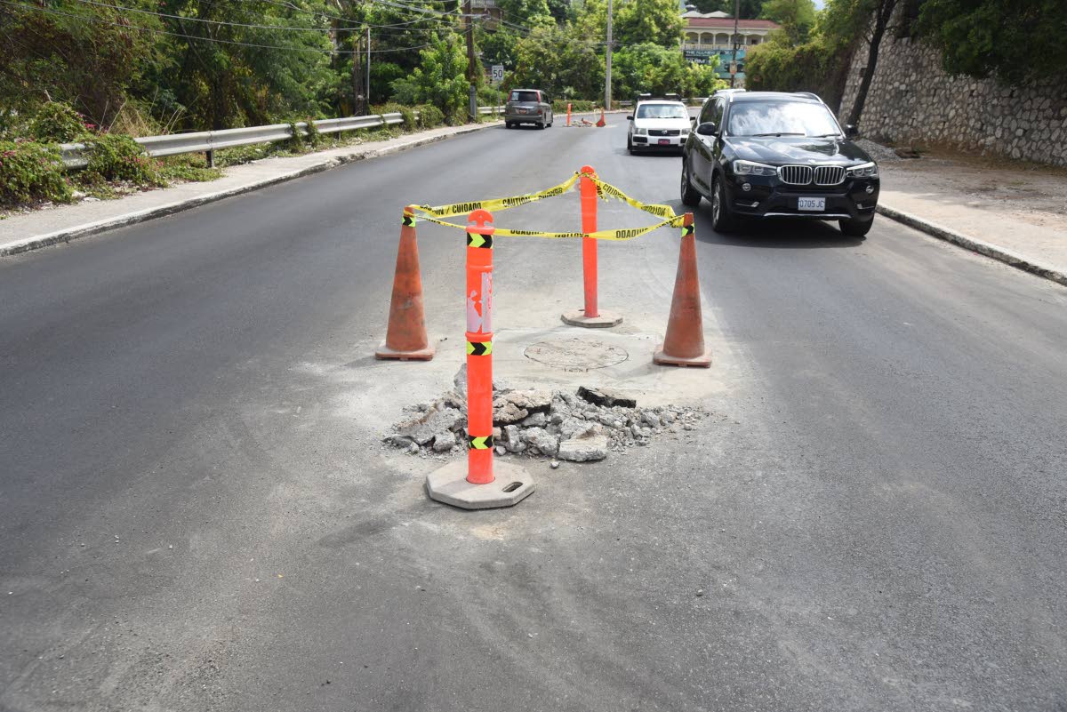 Munroe road in St. Andrew that is currently being resurfaced.