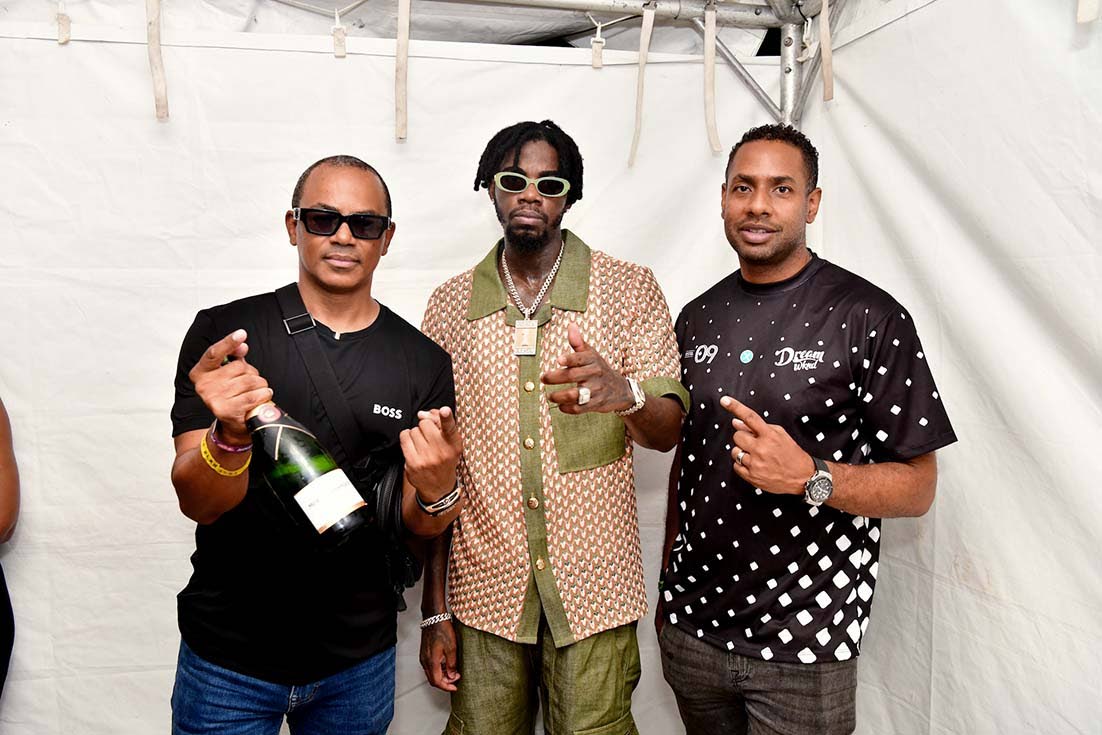 Dream Entertainment’s Group Managing Director, Scott Dunn (left)  and Executive Chairman, Kamal Bankay (right) join Alkaline backstage at Dream Live on Friday at The Aqueduct.