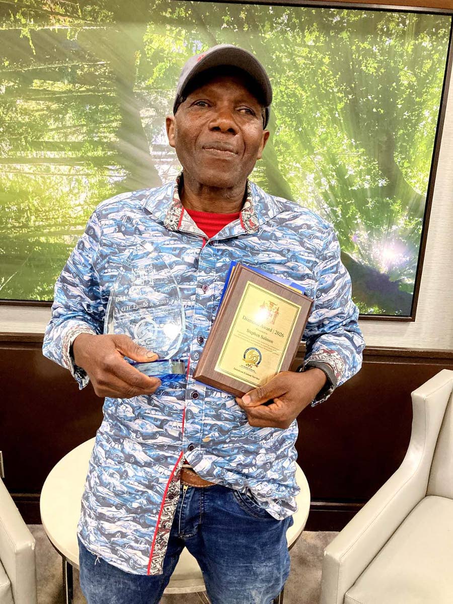 Stephen Salmon of G.H. Lambe & Son proudly displays his award during the Seasonal Agricultural Worker Programme (SAWP) Diamond Jubilee Awards Reception in The Blue Mountains, Ontario.