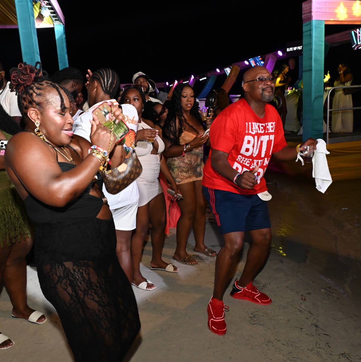 Kimberly Richards (left) and Allan Barrett soak up the party vibes during Bad Beaches. 