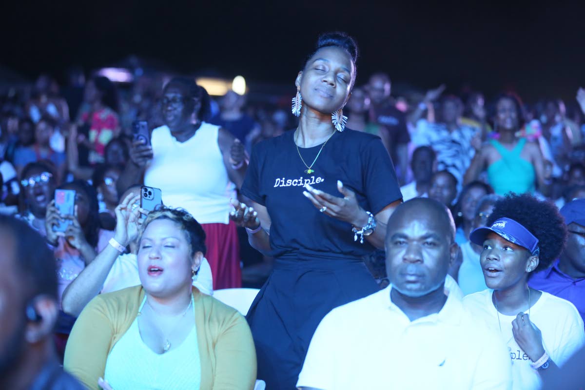 Dr Terri-Karelle Johnson is captured in a moment of heartfelt worship in the audience at Come Alive 2026.