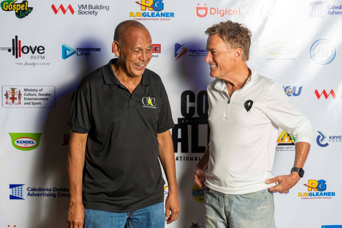 Eric Hosin (left) shares a backstage moment with headline act Michael W. Smith.