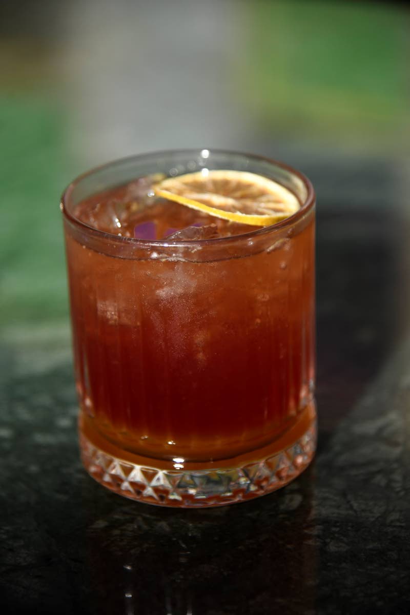 The passion fruit cognac is made with cognac, passion fruit, lemon and soda water, and served over ice.