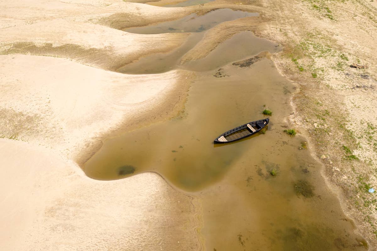 Usually submerged areas of the Danube River are exposed amid a drought in Rasova, Romania, Monday.