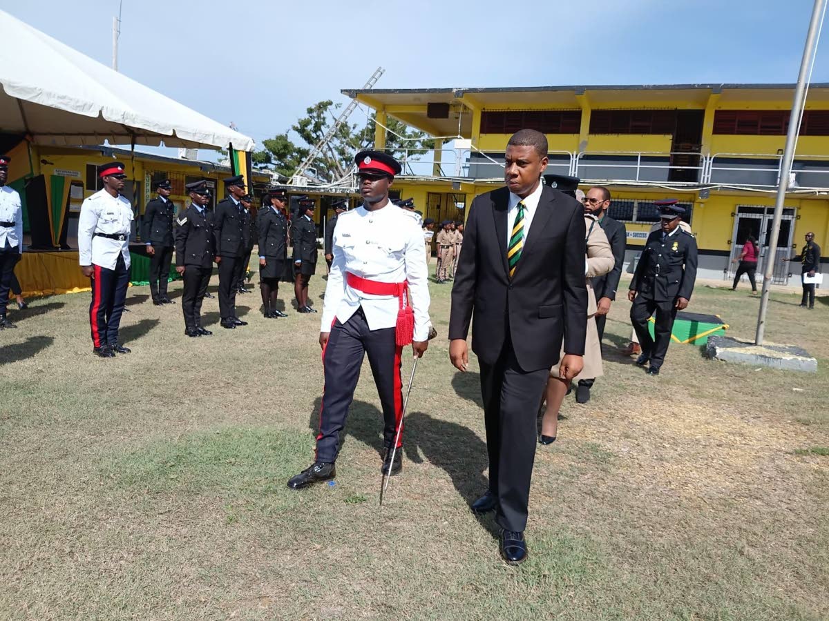 Custos of St Elizabeth, Stevon Sheriffe, is escorted to inspect the Guard of Honour during the Independence Day Flag-Raising Ceremony at Black River High School in St Elizabeth on Thursday, August 6.