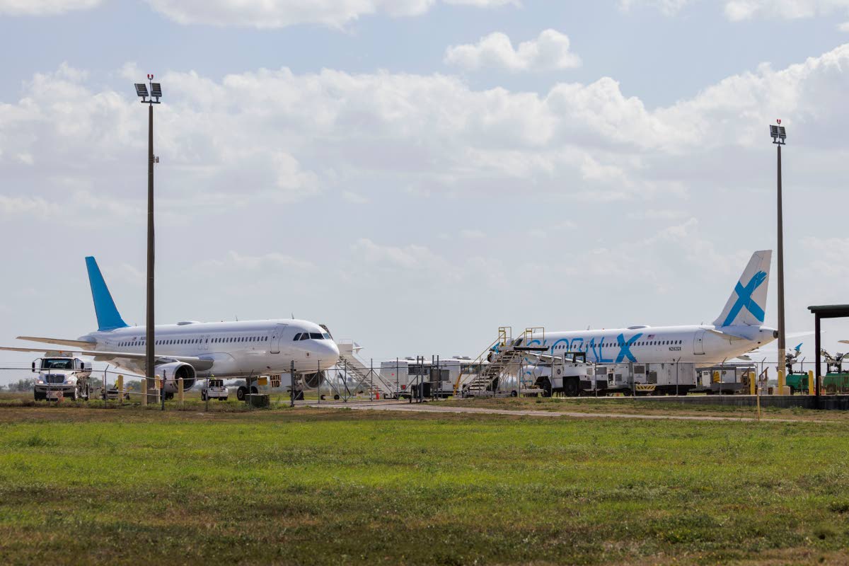 Planes used for deportation flights sit at the Valley International Airport, in Harlingen, Texas.