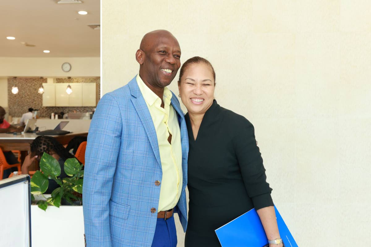 Hugh Graham (left), director at Paramount Jamaica Limited, and Carlene Lyn, vice-president, corporate and commercial banking division, National Commercial Bank Jamaica Limited, at the inaugural staging of the NCB Corporate Insights Breakfast.