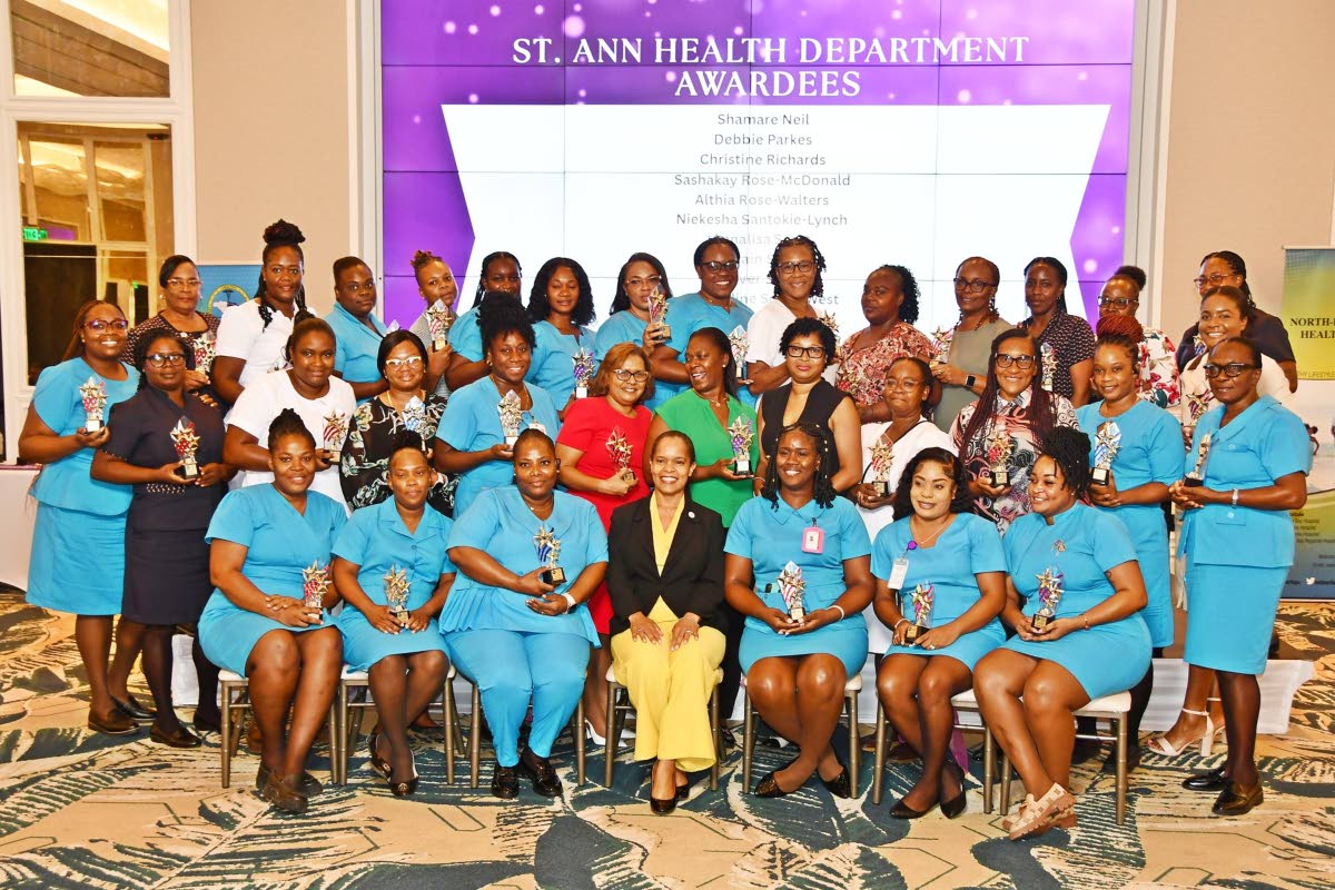 St Ann Health Department workers, with parish manager, St Ann Health, Nadia Nunes-Hyde, seated front, middle.