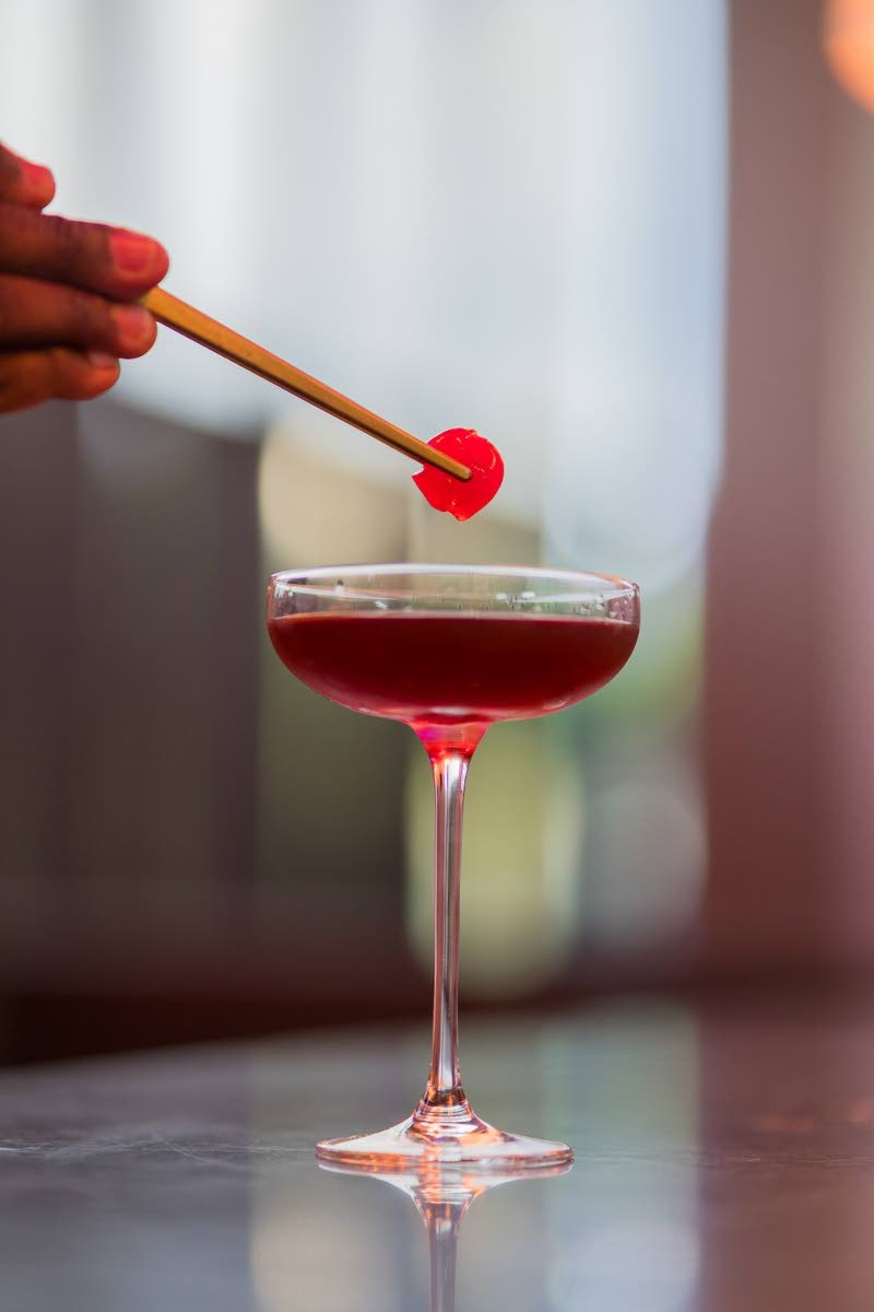Garnish your Sherry Manhattan with a cherry. 