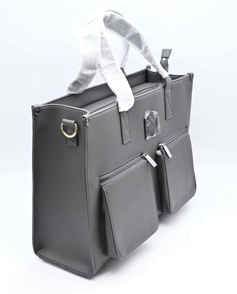 The grey SM Kollection Tote offers a contemporary take on a classic neutral, reflecting founder Shacqueal Major’s vision of creating polished statement pieces for the woman on the move.