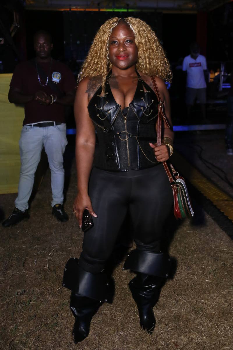 Bridgette Bennett, attorney-at-law, is all smiles as she gears up to see Beenie Man perform.