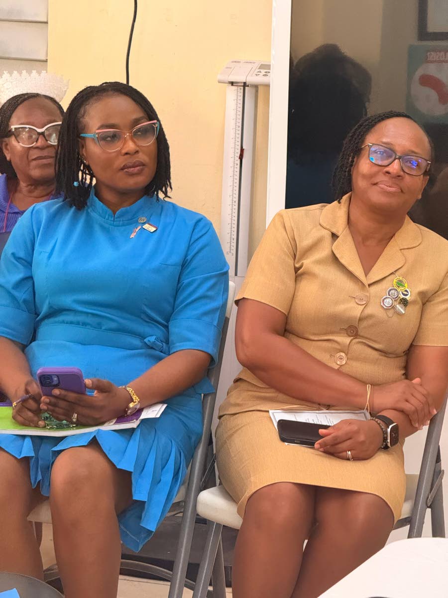 Kimberley Mathurin Legore (left), community health aid; and Carol Beharie, senior public health nurse in the Westmoreland Public Health Services, at the FIT launch ceremony.