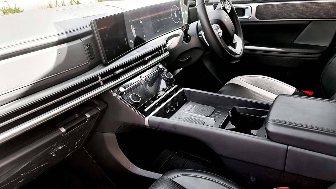 The Santa Fe’s interior prioritises functionality with ample storage throughout the cabin.