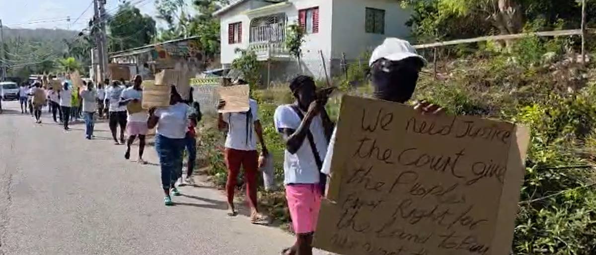 Residents of Cooper’s Pen, Trelawny, march on Saturday to bring attention to their plight. They are asking the Government to assist with relocation after their homes were demolished over a week ago.