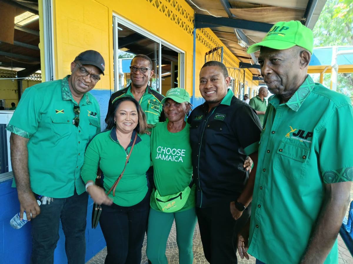 Deputy Leader for Area Council Four J. C. Hutchinson (right) and Floyd Green,chairman of Area Council Four, join Westmoreland Central caretaker George Wright and Delroy Slowley, caretaker for St Elizabeth North East, respectively, in welcoming Councillor J