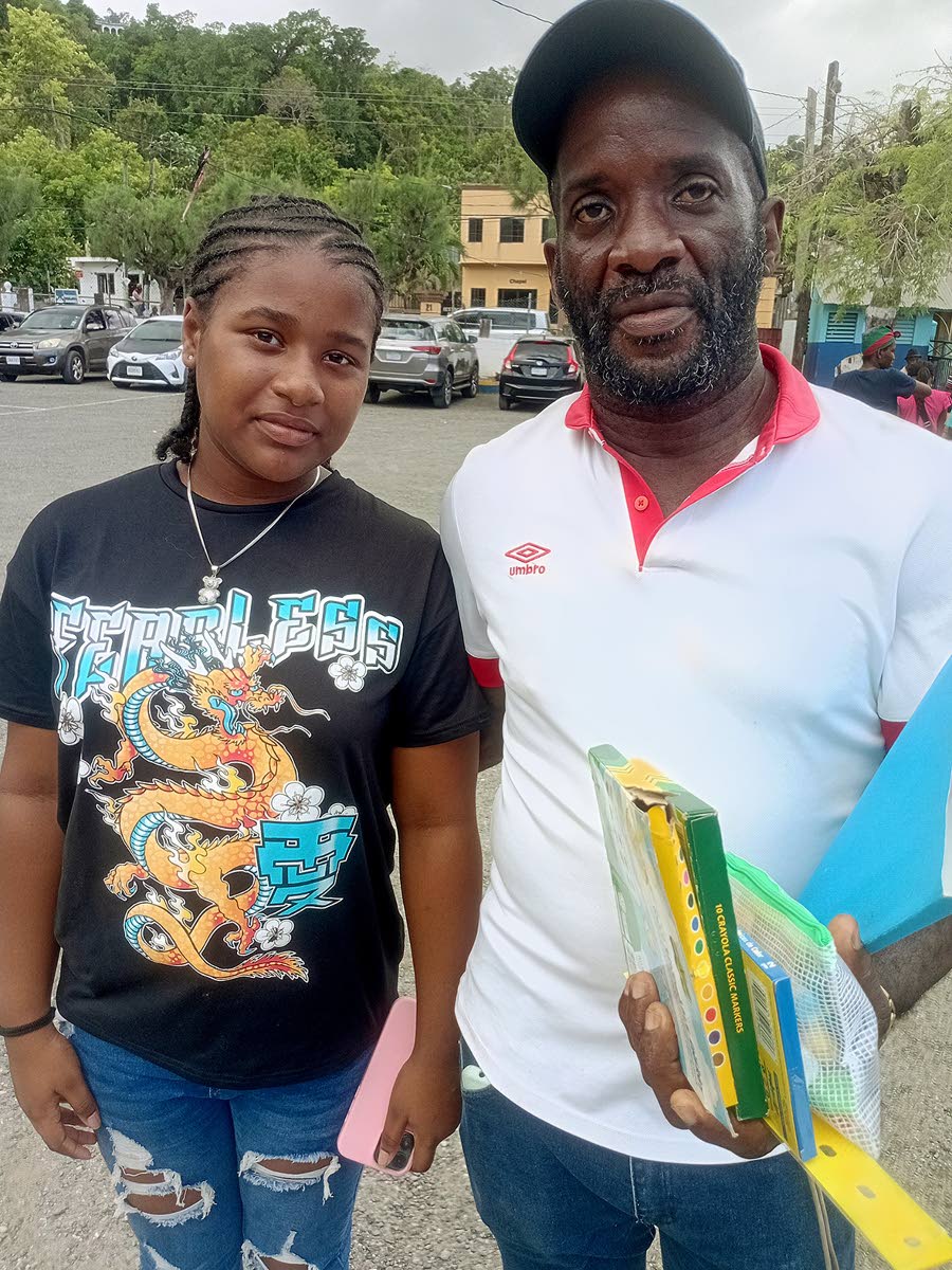 Craig Francis accompanied his niece, Amanda Hall, to a back-to-school medical clinic.