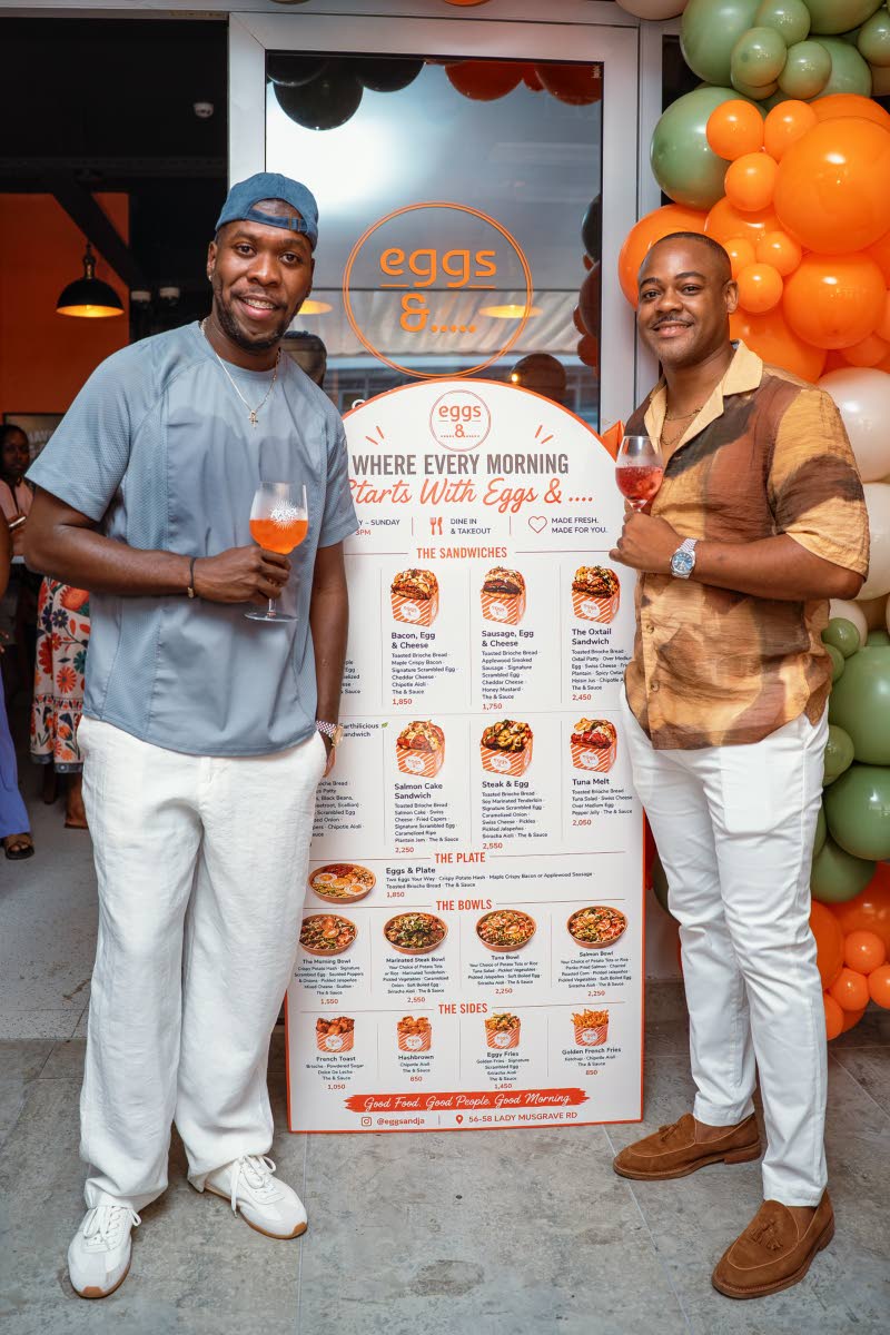 Eggs &... co-principals Chef Damion ‘Stewie’ Stewart (left) and Kwasi Henry are all smiles as they celebrate the opening of their new breakfast concept eatery on Lady Musgrave Road in St Andrew. 