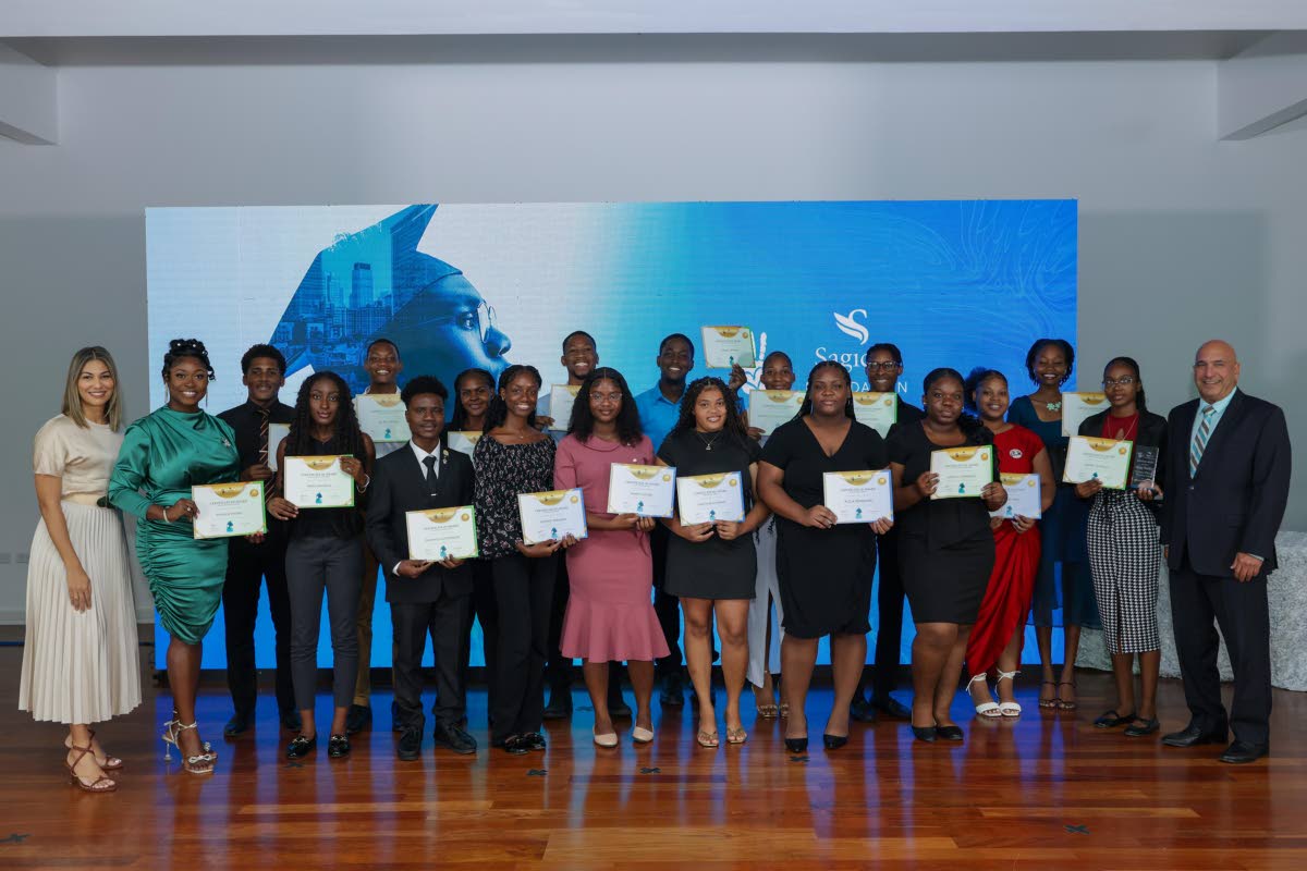 The 2026 cohort of Sagicor Foundation Jamaica’s Tertiary Scholarship Programme poses for a group photograph alongside Christopher Zacca (far right), president & CEO, Sagicor Group Jamaica and chairman of Sagicor Foundation Jamaica, and Nicole Campbell Ro
