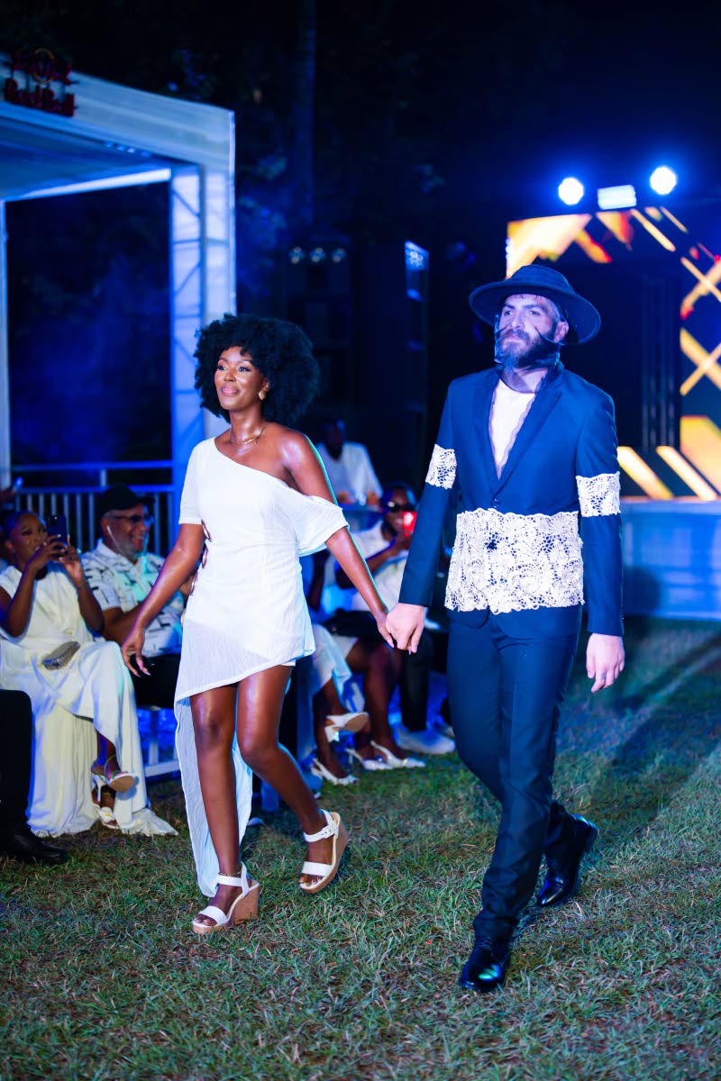 Davene Jonas (left) and Sliman Saadieh close the fashion show.