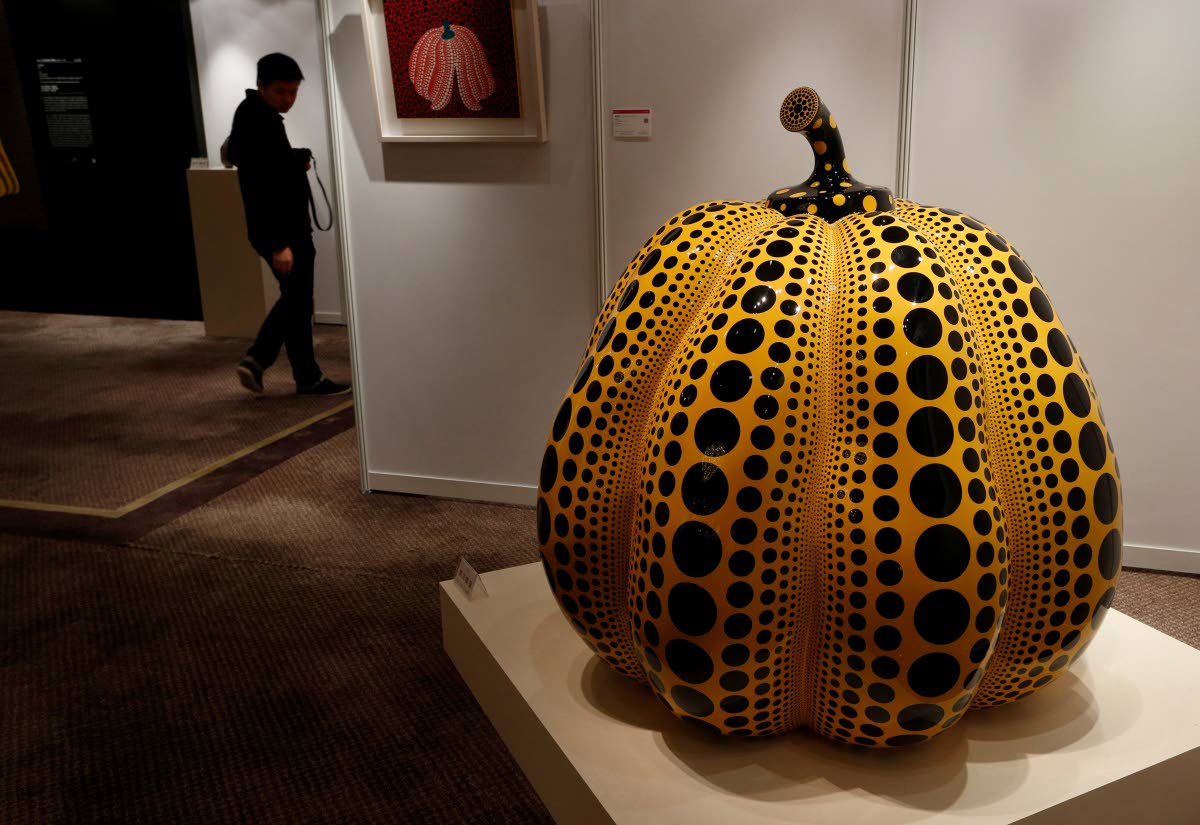 ‘Pumpkin’ by Japanese artist Yayoi Kusama during the Ravenel auction press preview in Hong Kong, on November 23, 2012.