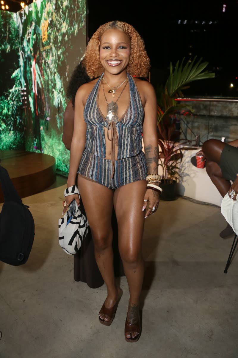 Artiste and choreographer Amanyea showed some skin in a vertical-striped halter.