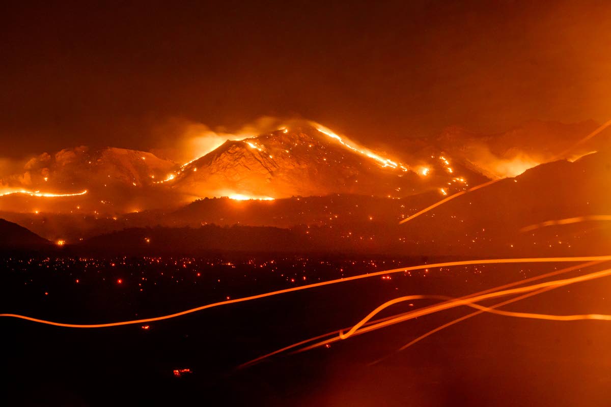 The Bug Fire burns near Doyle in unincorporated Lassen County, California, on August 13.  