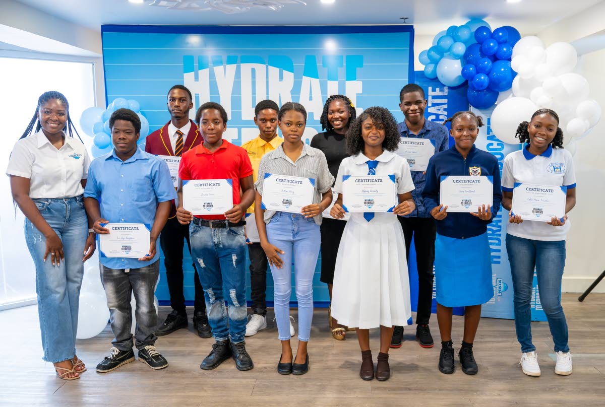 Jusanna Staple (left), brand coordinator, WATA Portfolio, Wisynco Group Ltd, shares a moment with Hydrate to Educate student awardees during the WATA Hydrate to Educate Awards Luncheon at the S Hotel in Montego Bay on Wednesday, August 26. Sharing the mome