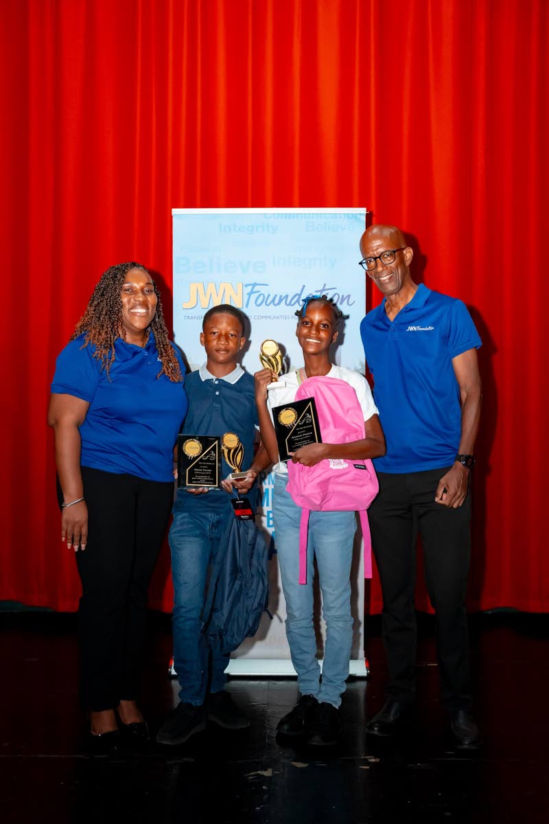 JWN Foundation Directors Marsha Haughton (left) and Clement 'Jimmy' Lawrence (right) with top male and female PEP awardees Sedain Palmer (second left) and Adamanie Francis..