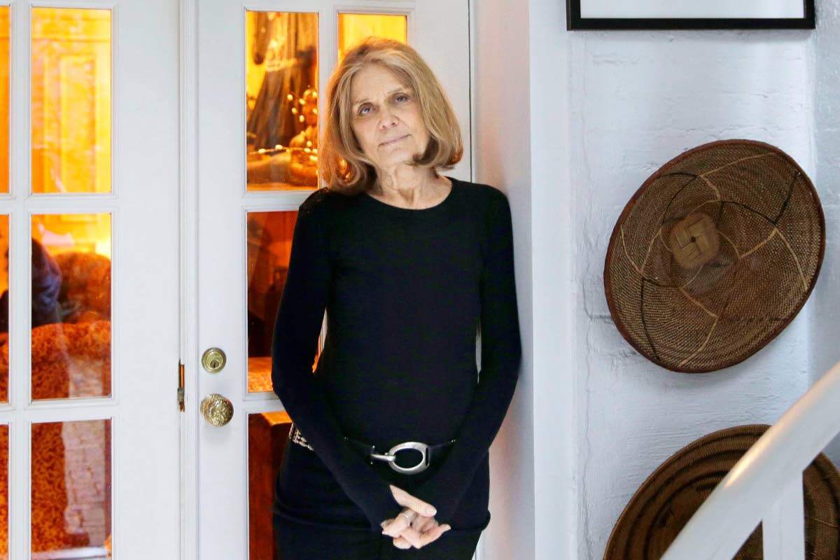 Gloria Steinem poses for a picture at her home in New York on October 19, 2015. 