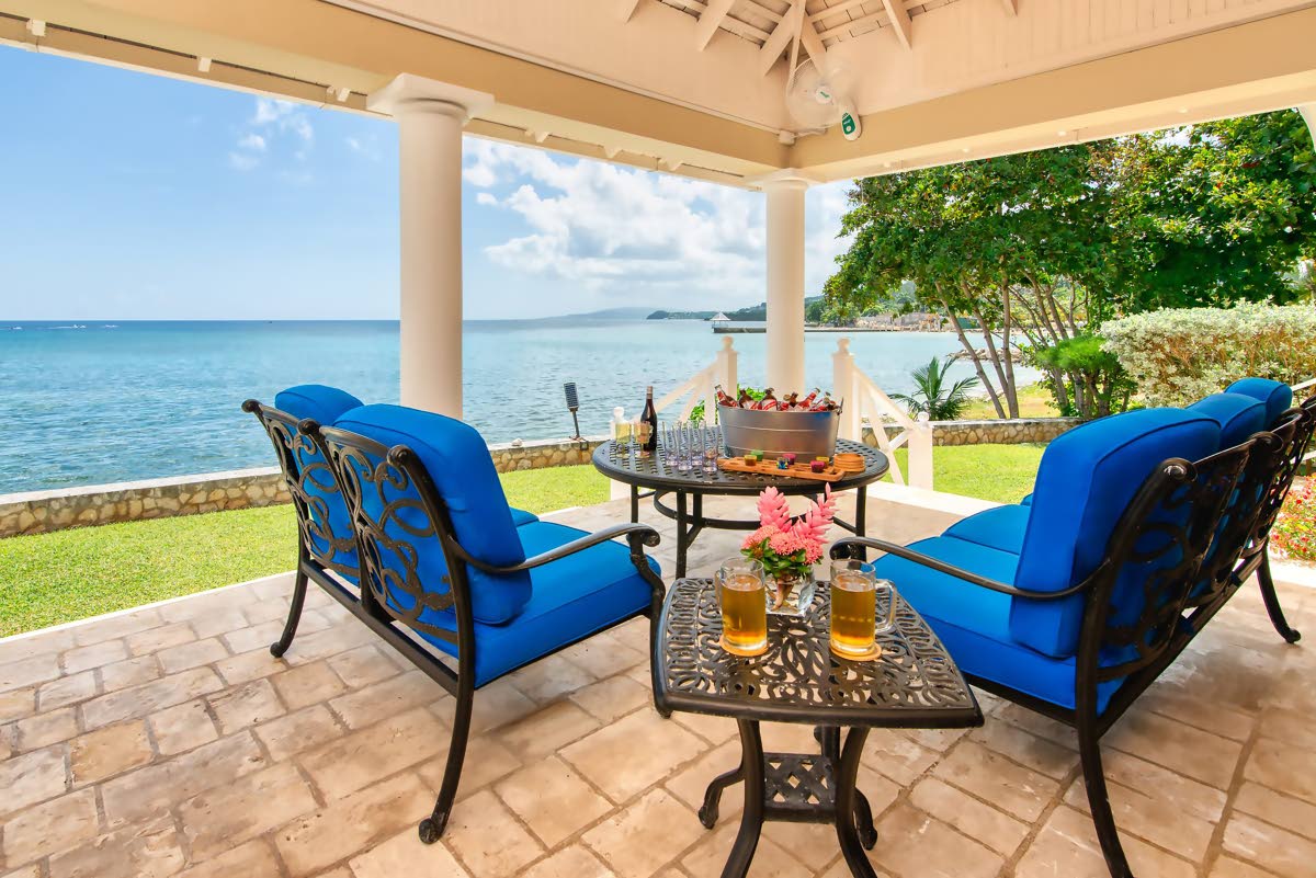 
Enjoy tranquil waterfront views from the living-dining room terrace.