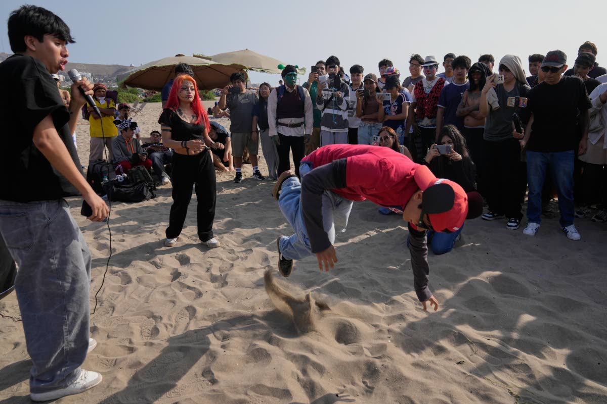 ‘Ciclope’, or Cyclops and ‘Chamo, or dude face off in an aura-farming battle at Las Sombrillas beach in Lima, Peru, on  August 29. 