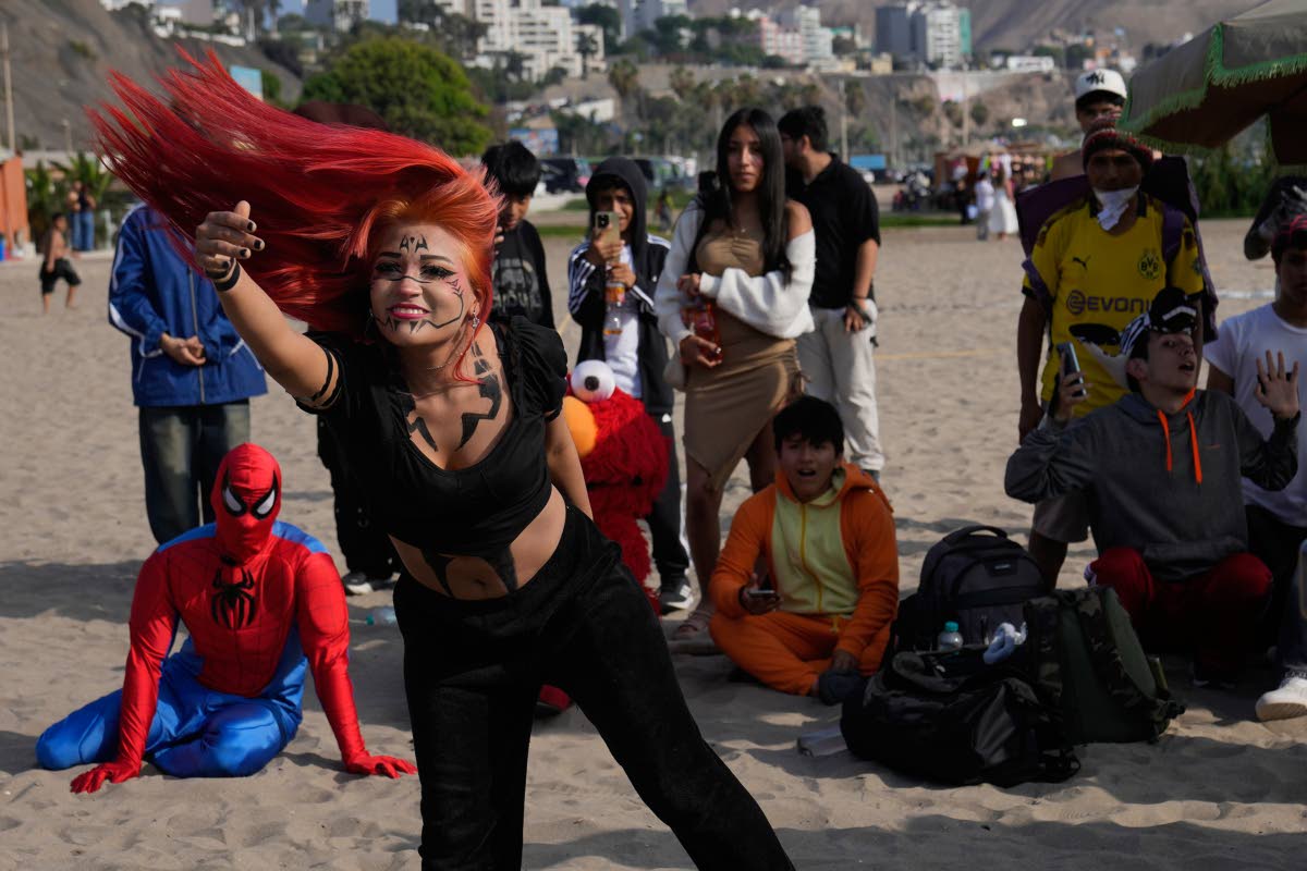 A participant who goes by ‘Ciclope’, or Cyclops, competes in an aura-farming battle at Las Sombrillas beach in Lima, Peru. 