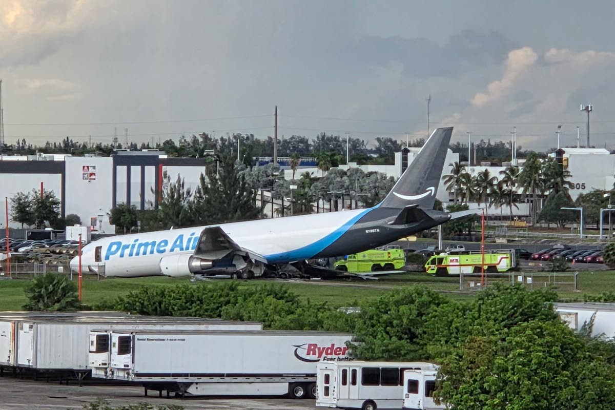 An Amazon cargo plane sits at the Miami International Airport (MIA) after it overshot the runway, Sunday, Sept. 6, 2026. (AP Photo/David Fischer)