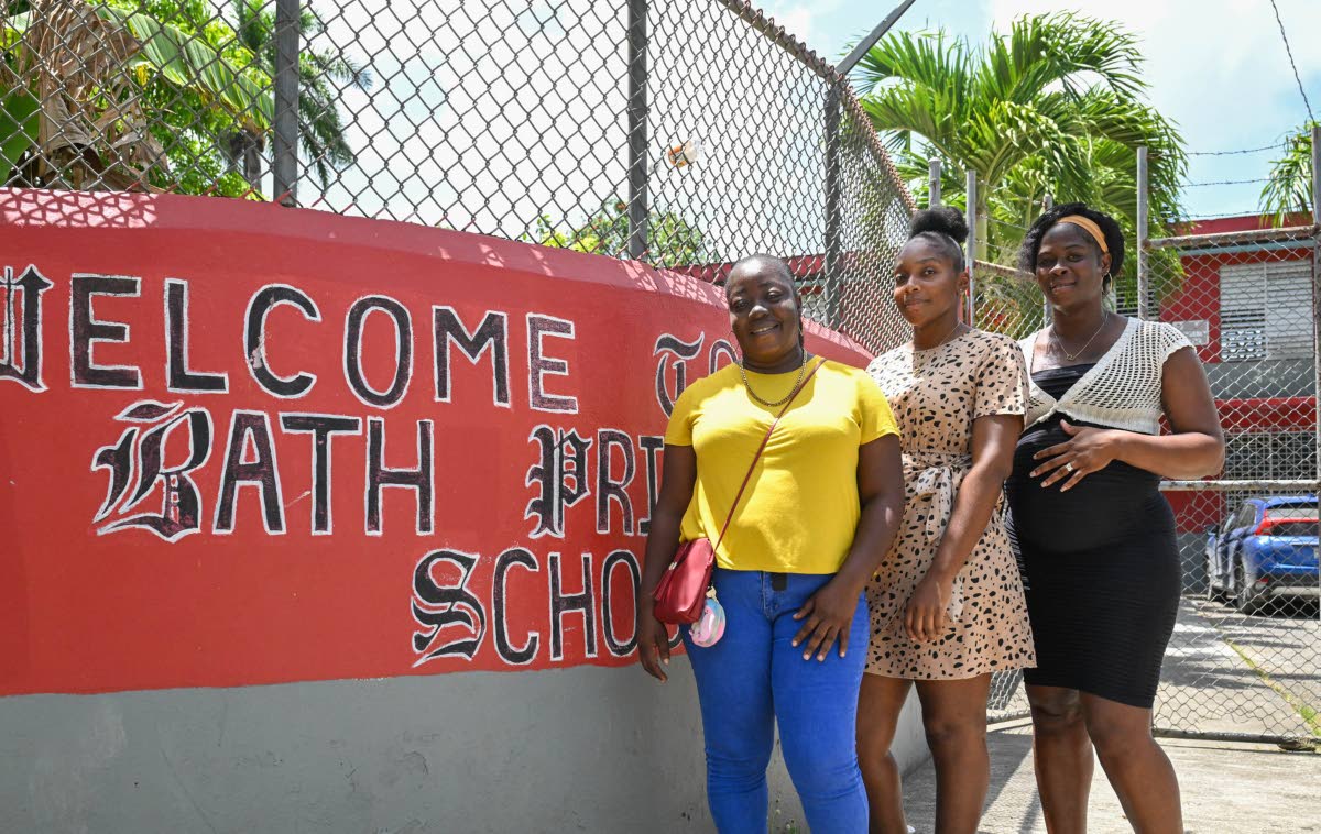 The three mothers who passed the 2026 Caribbean Secondary Education Certificate (CSEC) English A examination after being tutored by Principal of Bath Primary School in St Thomas, Devmarie Blake-Brown, are (from left) Venice Hunter, Chanique Ewen and Mickie