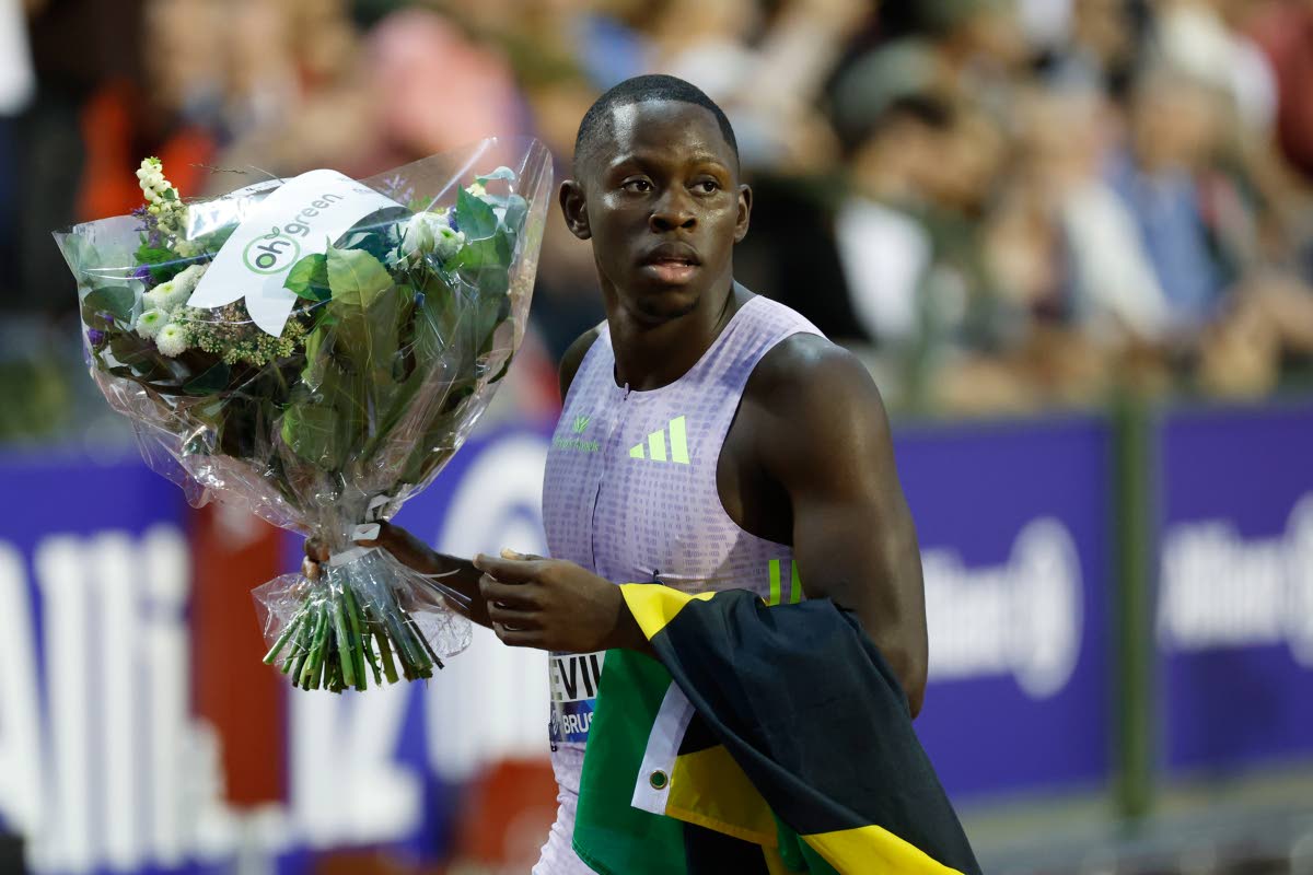 Jamaica's Oblique Seville celebrates winning the men's 100 metres at the Wanda Diamond League Final athletics meeting in Brussels, Belgium, on Friday.