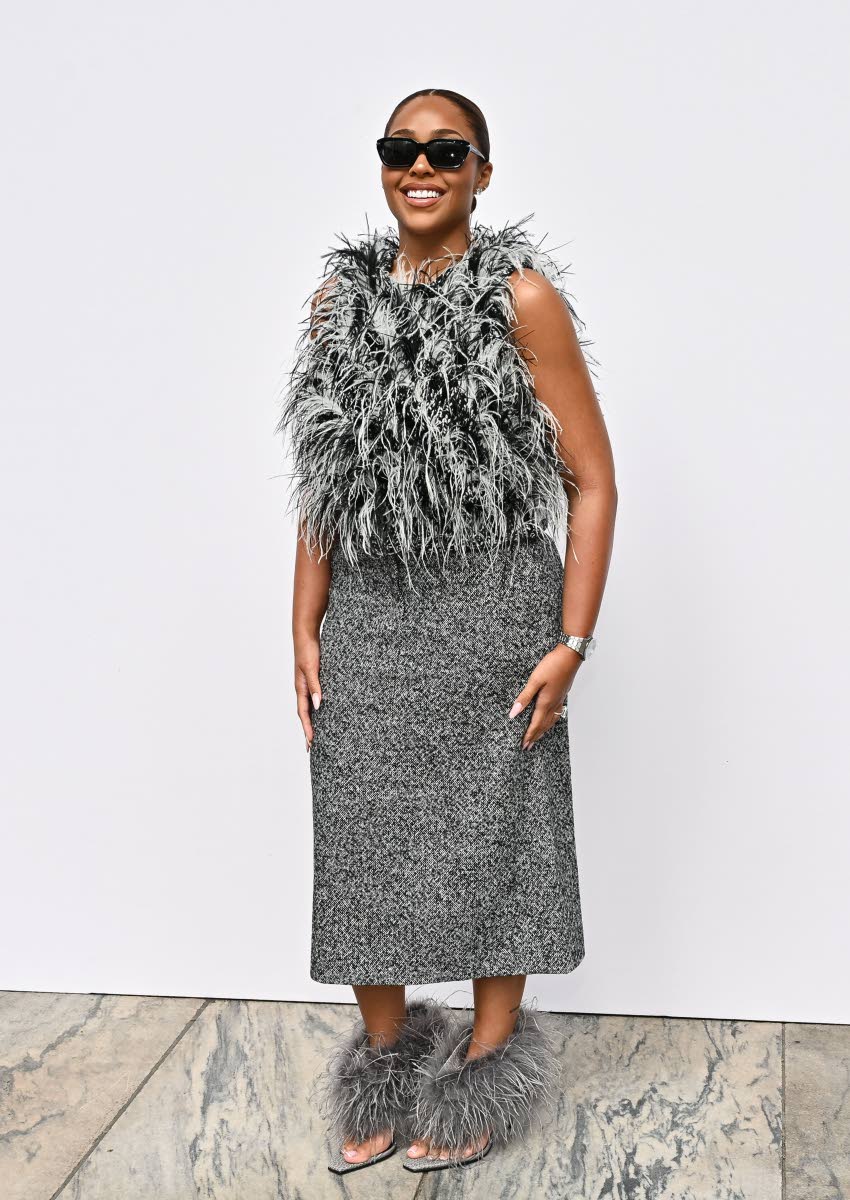 Fresh off her honeymoon, Jordyn Woods brings a little feathered flair to New York Fashion Week.