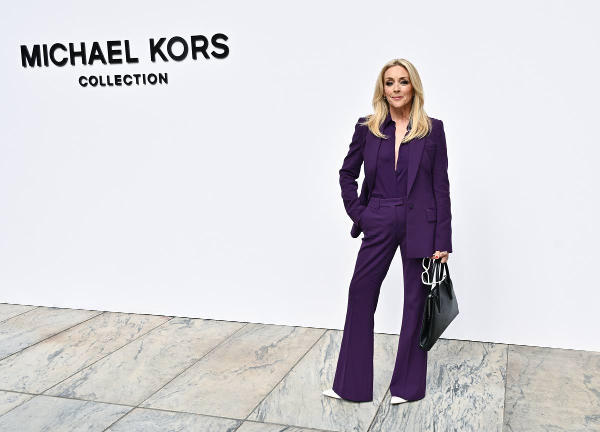 Jane Krakowski keeps it sharp and striking in rich purple.
