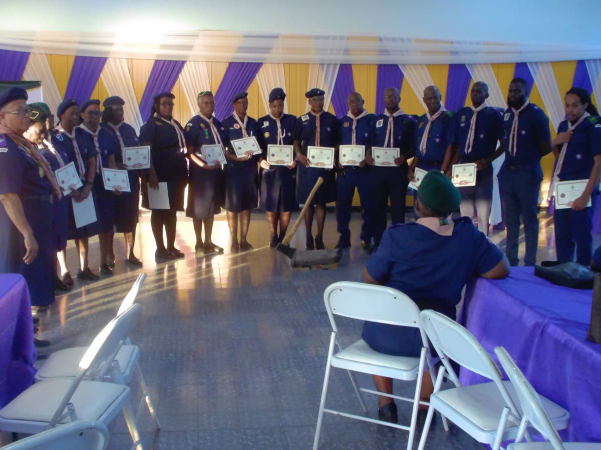 Cislyn McLeish (seated), national training commissioner of the Scout Association of Jamaica, urges the newest Gilwellians to use their training to mentor others and support the association’s growth and development.