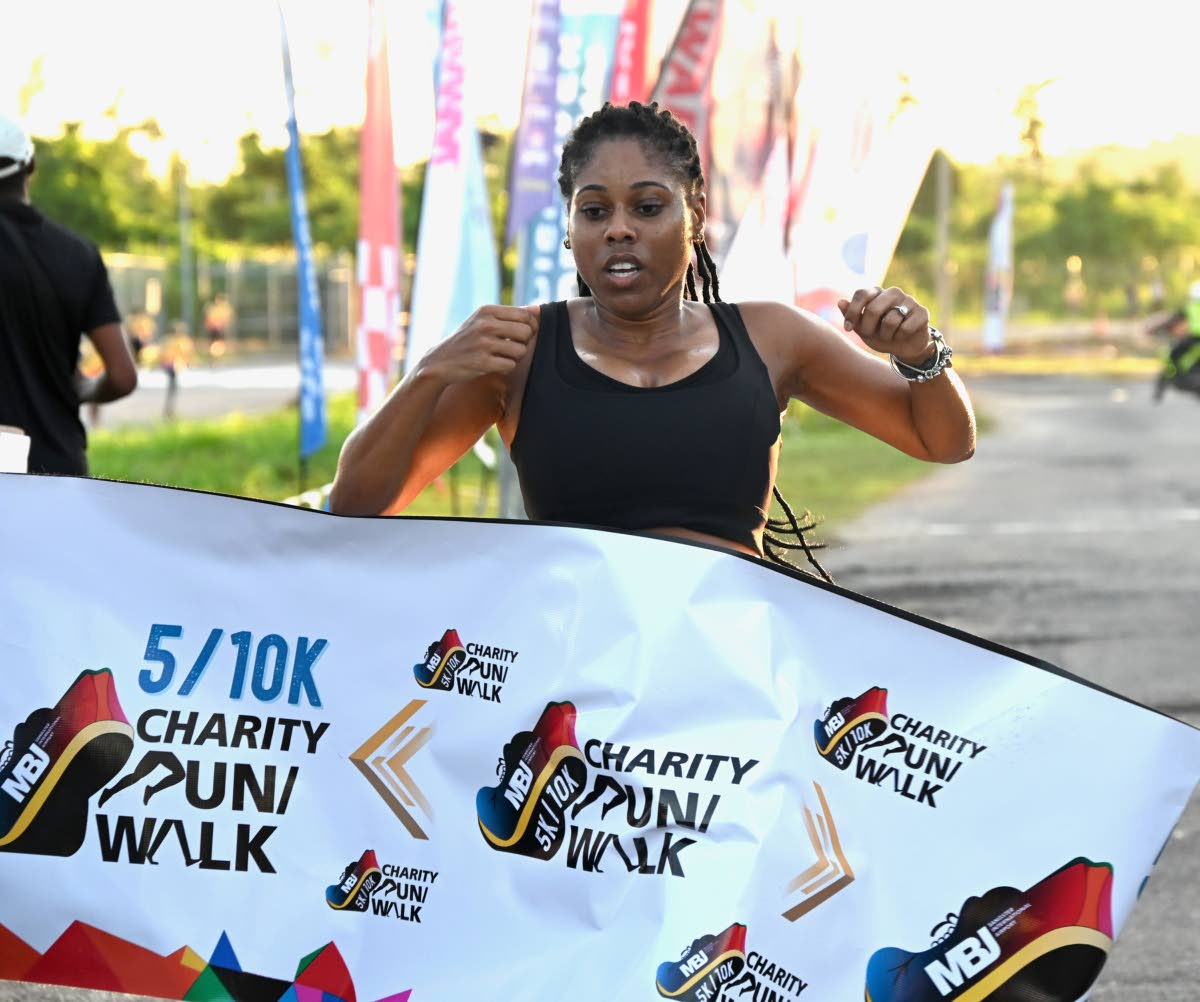 
Dandie Williams celebrates victory in the 5K Run at the MBJ Charity Run/Walk at Sangster International Airport in Montego Bay on Sunday, September 6.