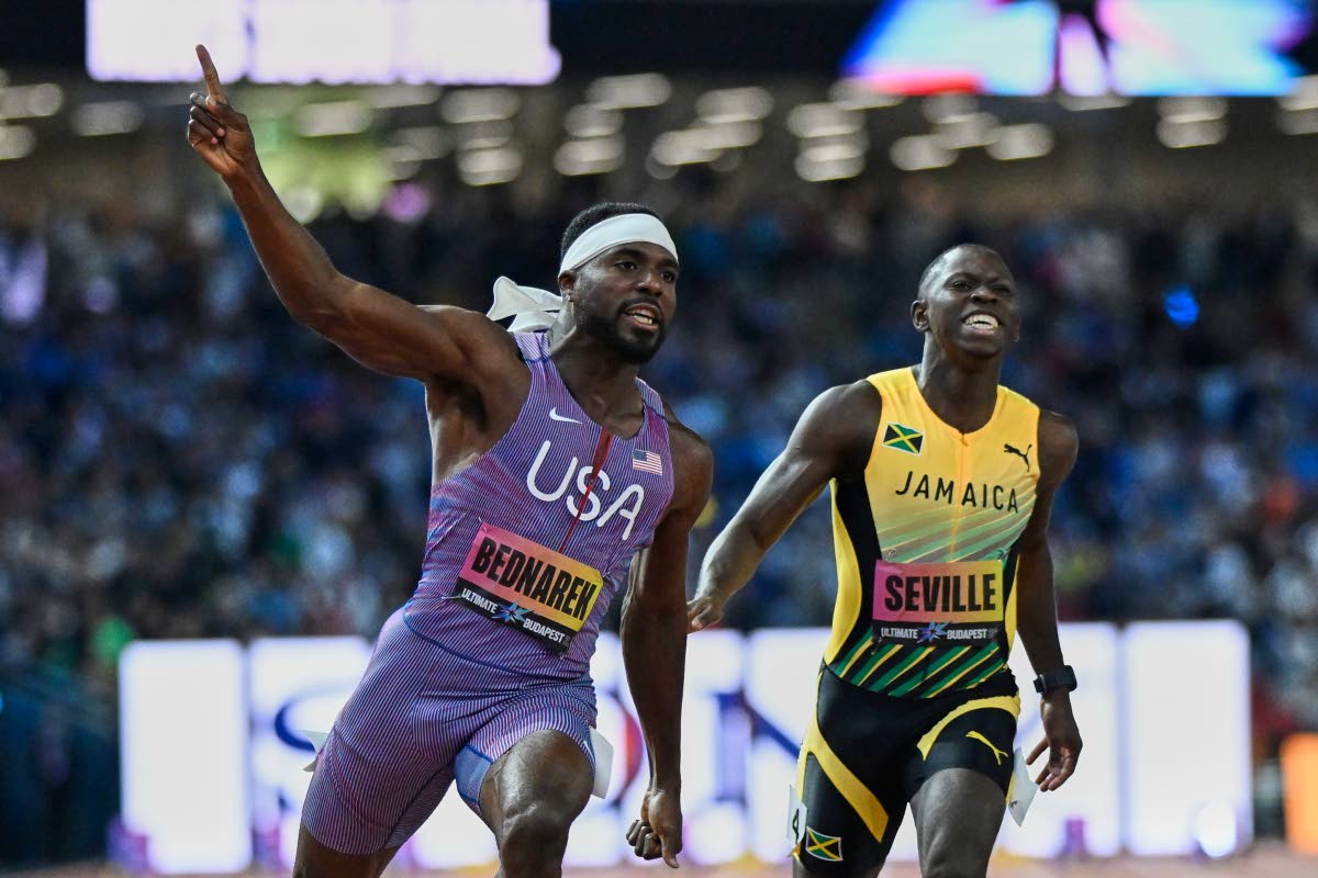 
Kenneth Bednarek, of the United States (left) beats Oblique Seville, of Jamaica to win the men’s 100-metre final at the World Athletics Ultimate Championship in Budapest, Hungary yesterday.