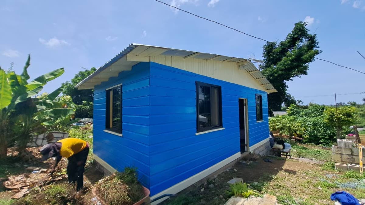 The new one-bedroom house donated to Damion Farquarson and his family by the Foster Triplets Ministries.