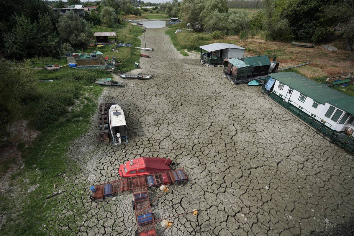 Boats sit on dry ground as water levels have dropped on the Danube River in Petrovaradin, Serbia, on August 25, 2026.